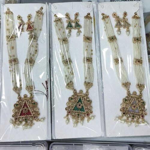 Pearl long set triangle pendle design😍